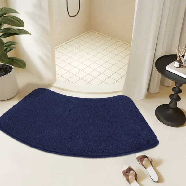 tapis rond bleu salle de bain